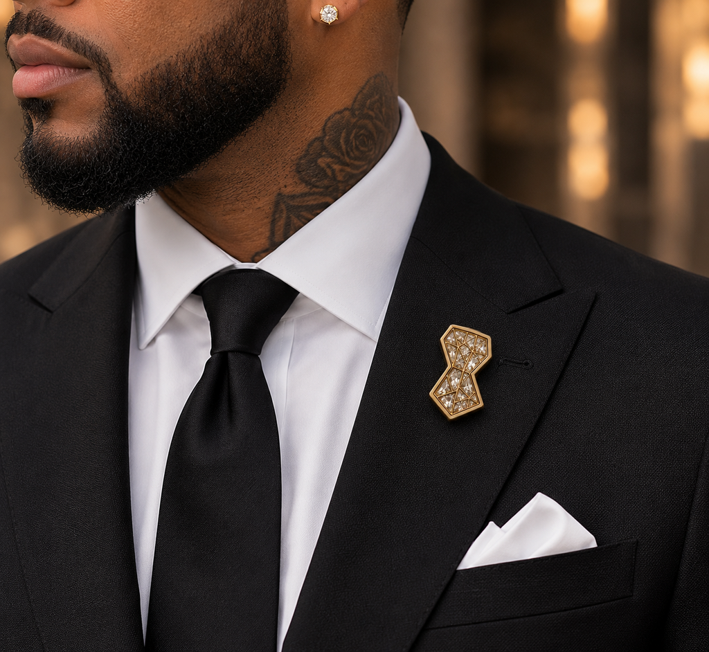 Symbols of Ambition lapel pin worn with black suit
