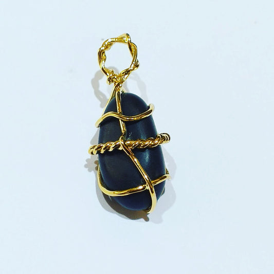 Luxury Onyx Pendant wrapped in solid 14kt gold.