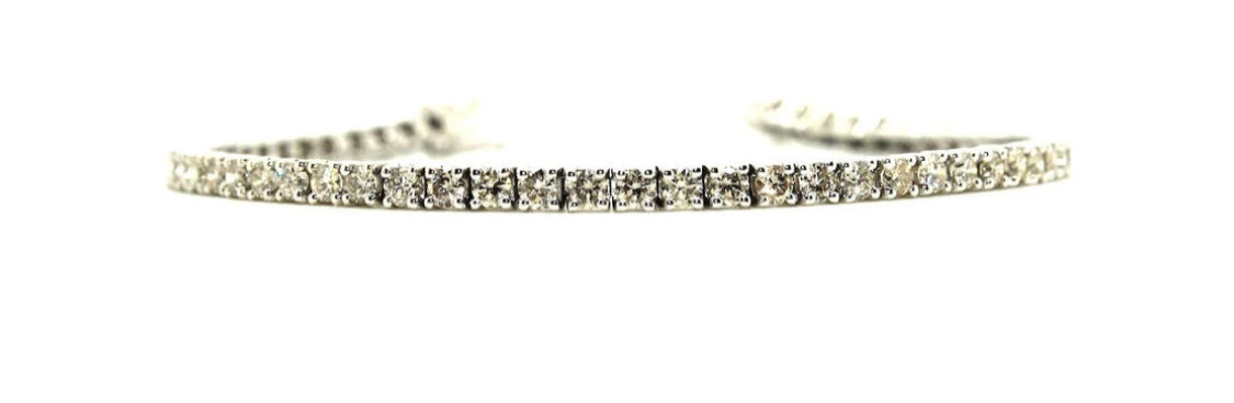 Diamond tennis bracelet in white gold by Q. Jones Custom